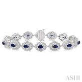 5x3 MM Oval Cut Sapphire and 1 Ctw Round Cut Diamond Precious Bracelet in 14K White Gold
